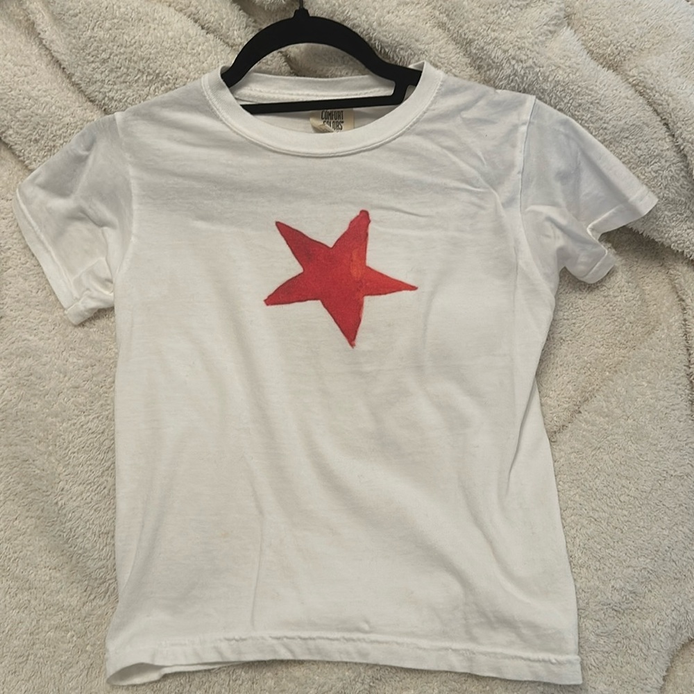 Baby tee from Etsy with a red star